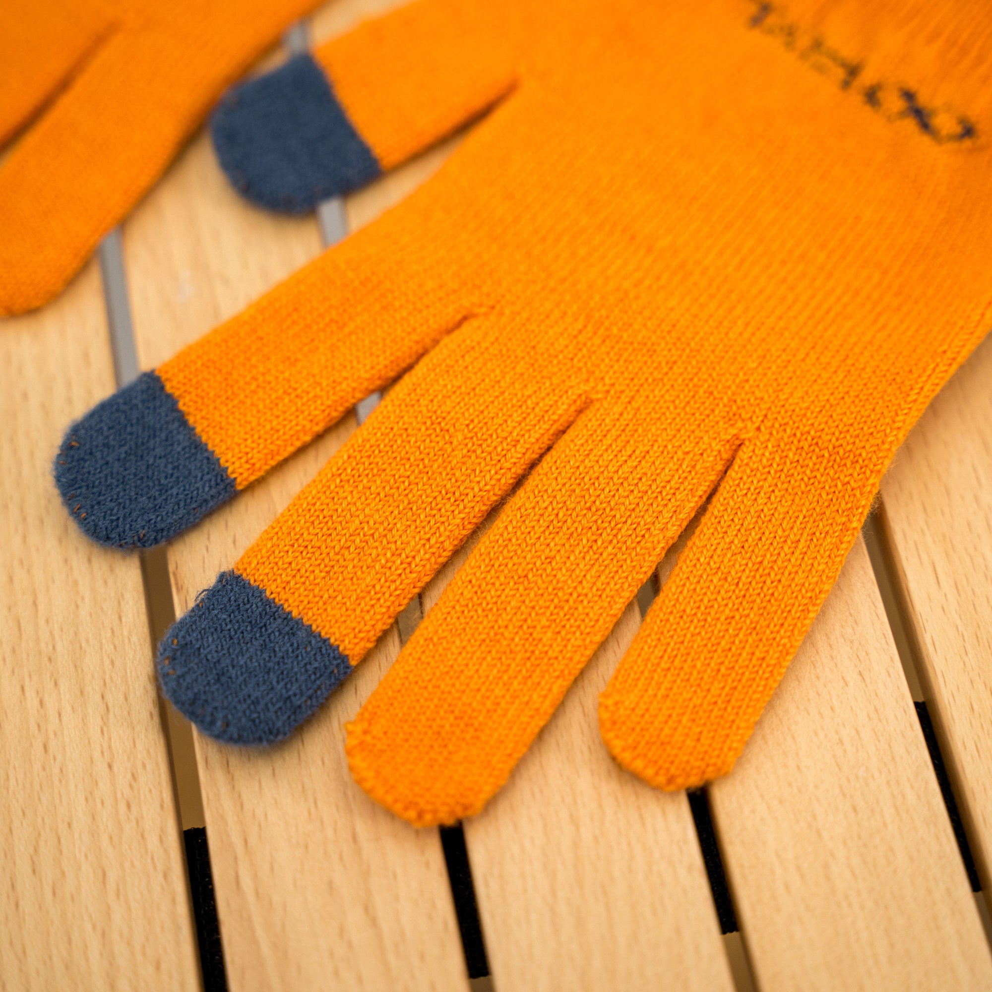 R×L｜メリノグローブ ミッドG / Runtripコラボ限定カラー (Orange × Navy)